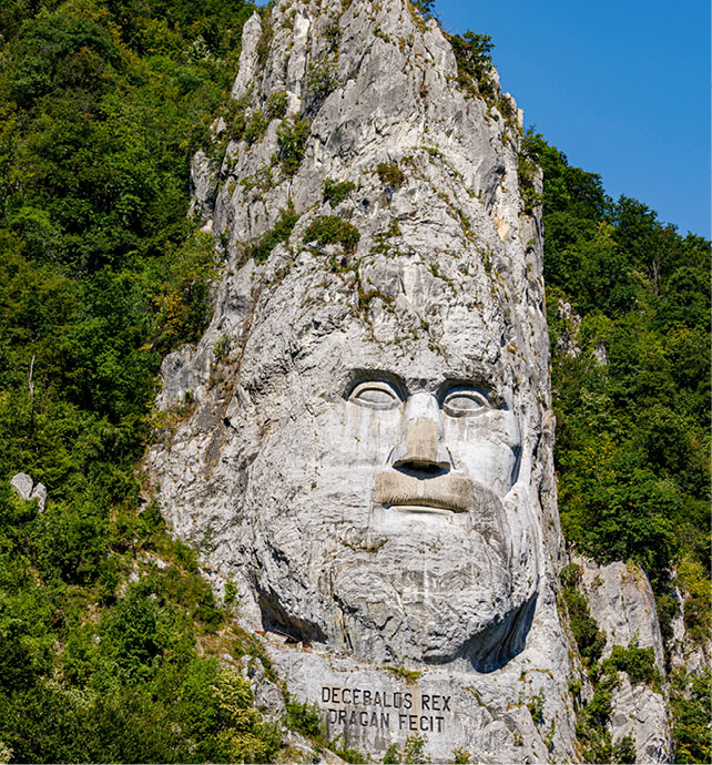 face carved into rock at Iron Gates along the Danube river
