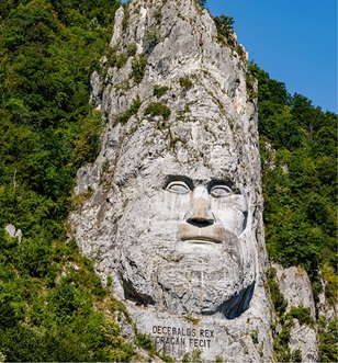 face carved into rock at Iron Gates along the Danube river