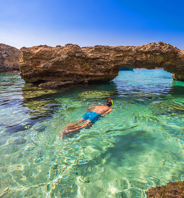 Guest snorkeling in Blue Lagoon, Malta
