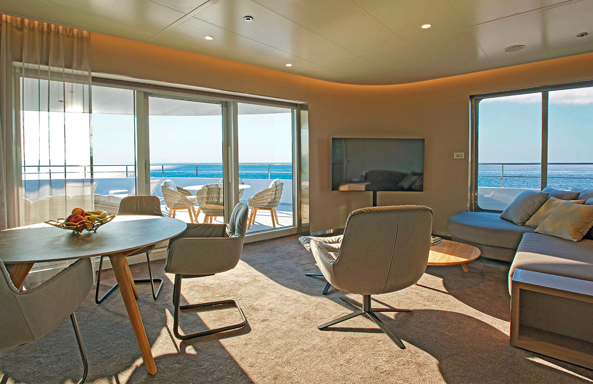 Owner's Suite with expansive view of balcony on the Emerald Sakara luxury yacht