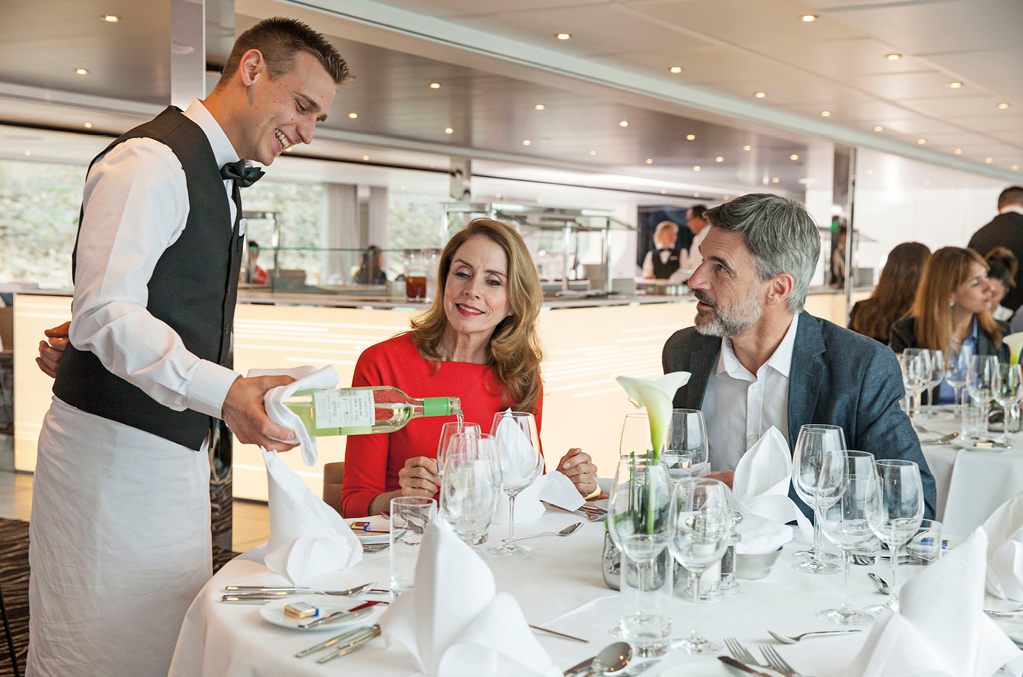 Couple fine dining on board a luxury Europe river ship