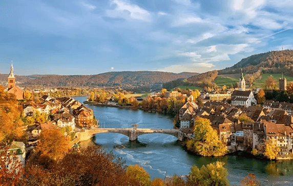 A quaint town nestled along the Rhine River in Autumn